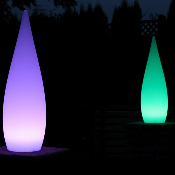 Two waterdrop lamps glowing in the dark